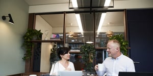 man-and-woman-having-a-meeting-in-the-office-2977581